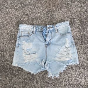 Super high rise shorts, light colored jean. Size small